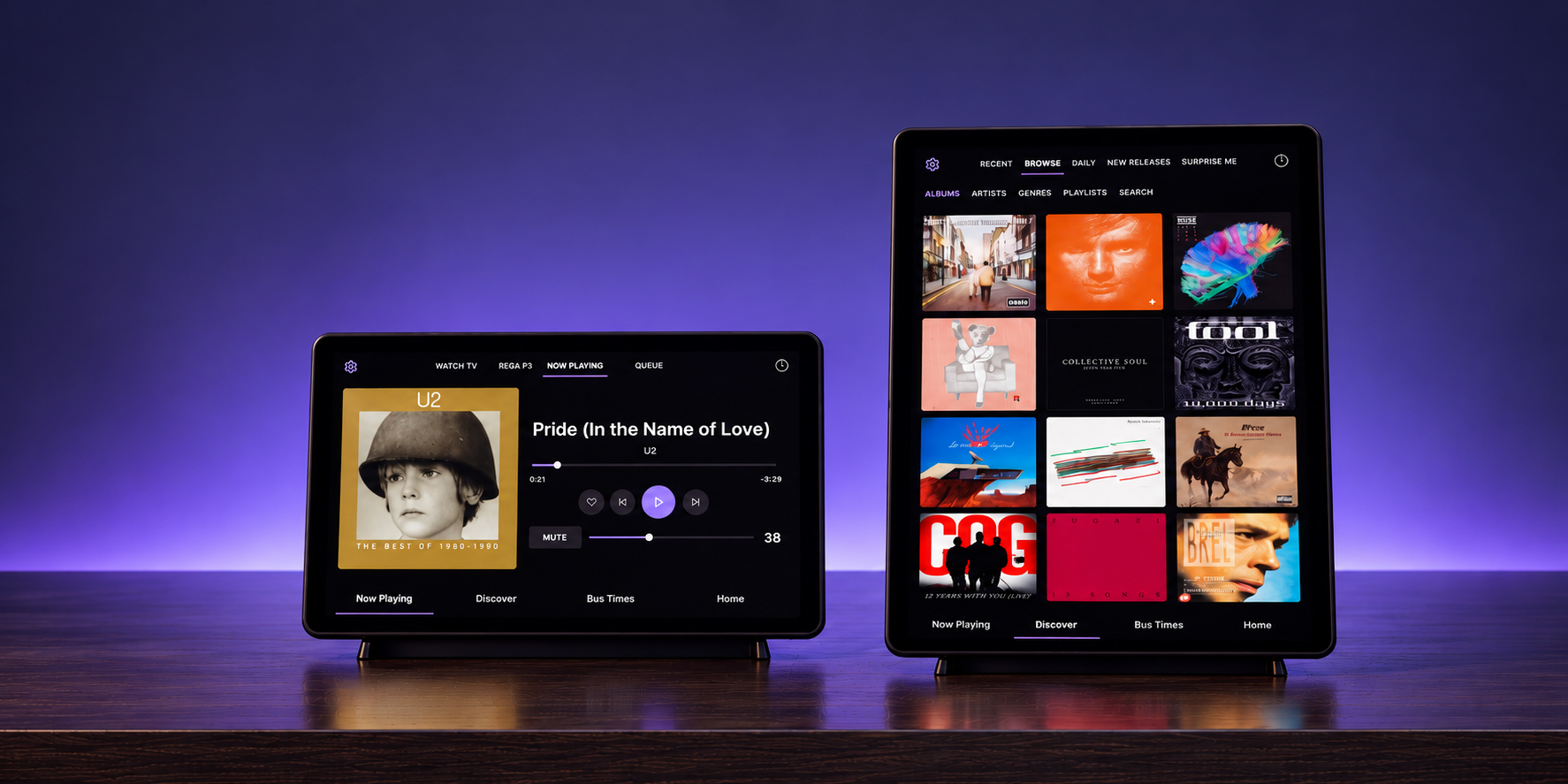 A seven-inch landscape and ten-inch portrait RoonDeck touchscreen in a purple-lit listening room